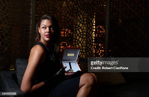 Elizabeth Cambage poses after winning the International Player of the Year at the 2013 Basketball Australia MVP Awards at Crown Palladium on March...