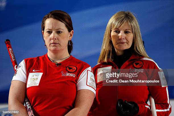 Debbie McCormick and Erika Brown of USA look on in the Bronze medal match between USA and Canada on Day 9 of the Titlis Glacier Mountain World...