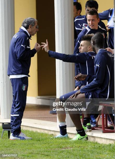 Stephan El Shaarawy, Mario Balotelli of Italy and Doctor Enrico Castellacci during an Italy training session at Coverciano on March 24, 2013 in...