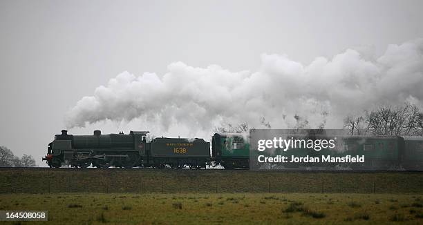 Train makes its first run along The Bluebell Railway from Sheffield Park to East Grinstead Station on March 23, 2013 in East Grinstead, England. The...