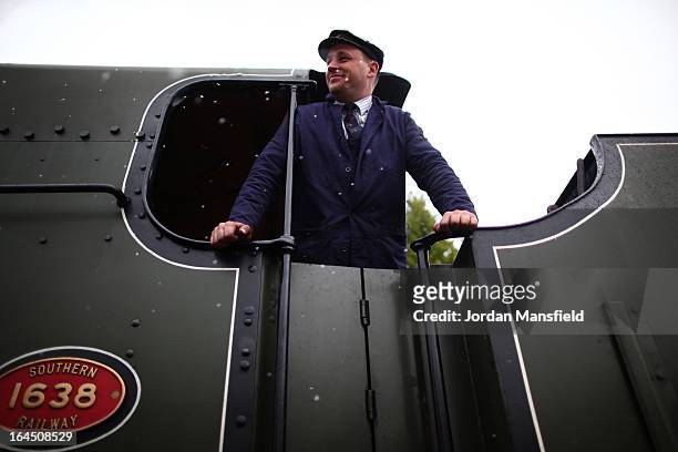 Fireman Darren French steers the The Grinstead Belle into East Grinstead Station for the first time on March 23, 2013 in East Grinstead, England. The...