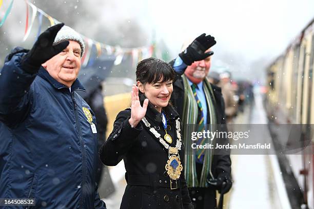 East Grinstead Mayoress Liz Bennett waves as the Grinsteade Belle arrives at East Grinstead Station for the first time on March 23, 2013 in East...