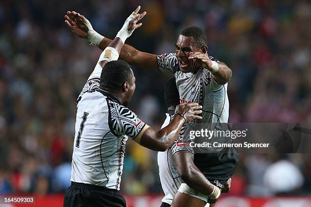 Ulaiyasi Lawavou and Jasa Veremalua of Fiji celebrate winning the Cup Final match between Fiji and Wales during day three of the 2013 Hong Kong...