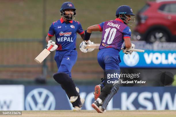 Dipendra Singh Airee of Nepal and Sompal Kami of Nepal run between the wickets during the Asia Cup Group A match between India and Nepal at Pallekele...