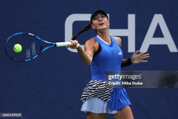 Elina Avanesyan returns a shot against Alize Cornet of France during their Women's Singles First Round match on Day One of the 2023 US Open at the...