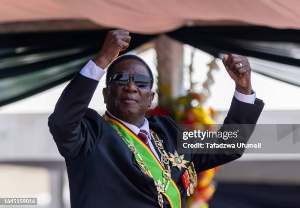Zimbabwe's president Emmerson Mnangagwa dances as he celebrates after being inaugurated at a local stadium on September 4, 2023 in Harare, Zimbabwe....