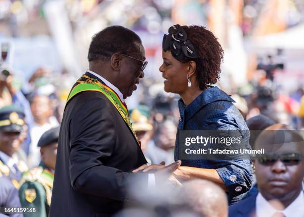 Zimbabwe's president Emmerson Mnangagwa has a chat with former president Robert Muagbe's wife, Grace Mugabe after he was inaugurated at a local...