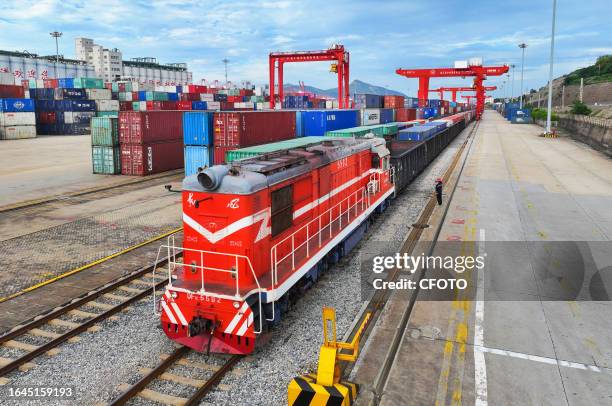 China-Europe train carrying machinery, equipment, auto parts and other goods is ready to depart at the China Kazakhstan Lianyungang Logistics...