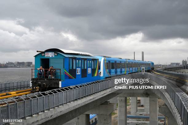 The Lagos Blue Line rail arrives at the Marina station during the inauguration of commercial operation of the mass transit in Lagos on September 4,...