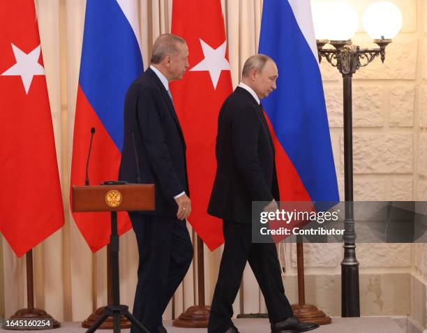 Russian President Vladimir Putin shakes hands with Turkish President Recep Tayyip Erdogan during their joint press conference on September 4 in...