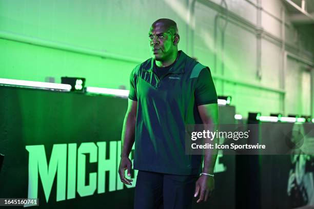 Michigan State Spartans head coach Mel Tucker walks through the tunnel before a college football game between the Michigan State Spartans and Central...