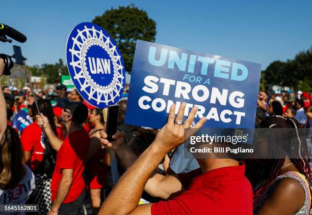 United Auto Workers members and others gather for a rally after marching in the Detroit Labor Day Parade on September 4, 2023 in Detroit, Michigan....