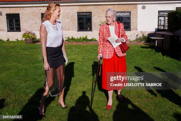 Denmark's Queen Margrethe II poses with Danish actress Connie Nielsen after presenting her with the Rungstedlund Prize at Rungstedlund , also known...