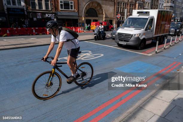 Cycle lane superhighway in Aldgate / Whitechapel on 16th August 2023 in London, United Kingdom. A cycle Superhighway is a long cycle path and part of...