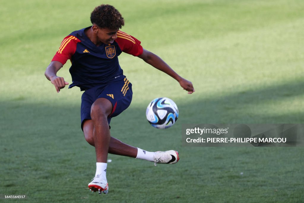 Spain's forward Lamine Yamal attends a training session ahead of the