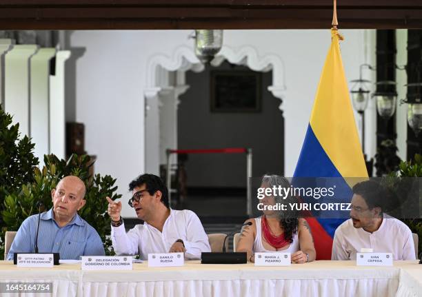 Delegates of the Colombian government, Otty Patino, Danilo Rueda, Maria Pizarro, and Ivan Cepeda, speak while taking part in an event in the...