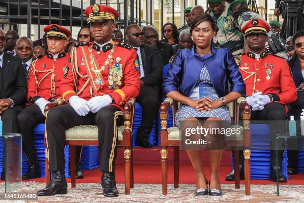 Gabon's new strongman General Brice Oligui Nguema , who was inaugurated as Gabon's interim President and his wife Zita Nyangue Oligui Nguema attend...