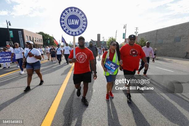 United Auto Workers members march in the Detroit Labor Day Parade on September 4, 2023 in Detroit, Michigan. The theme of this year's Parade is,...