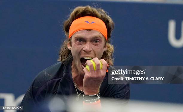 Russia's Andrey Rublev reacts as he plays against Britain's Jack Draper during the US Open tennis tournament men's singles round of 16 match at the...