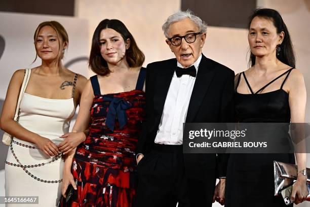 Director Woody Allen poses with Soon-Yi Previn and daughters Bechet Allen and Manzie Allen on the red carpet of the movie "Coup de Chance" presented...