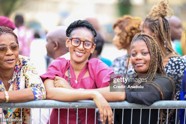 Citizens take part in the inauguration ceremony of General Brice Oligui Nguema, the head of the Committee for the Transition and the Restoration of...