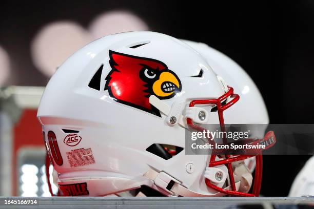 Cardinals football helmets on the sidelines during the AFLAC Kickoff Game between the Georgia Tech Yellow Jackets and the Louisville Cardinals on...