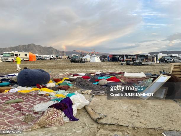 Muddy desert plain seen on September 3 after heavy rains turned the annual Burning Man festival site in Nevada's Black Rock desert into a mud pit....