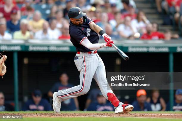 Royce Lewis of the Minnesota Twins hits a grand slam off Lucas Giolito of the Cleveland Guardians during the second inning at Progressive Field on...