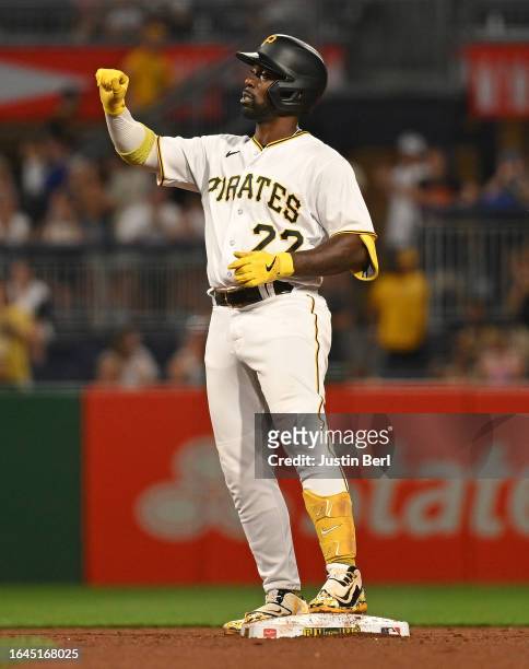 Andrew McCutchen of the Pittsburgh Pirates reacts at second base after hitting an RBI double in the fifth inning during the game against the...