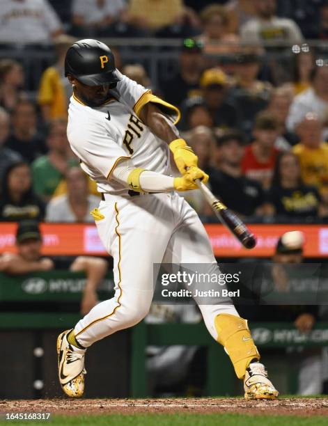 Andrew McCutchen of the Pittsburgh Pirates hits an RBI double in the fifth inning during the game against the Milwaukee Brewers at PNC Park on...