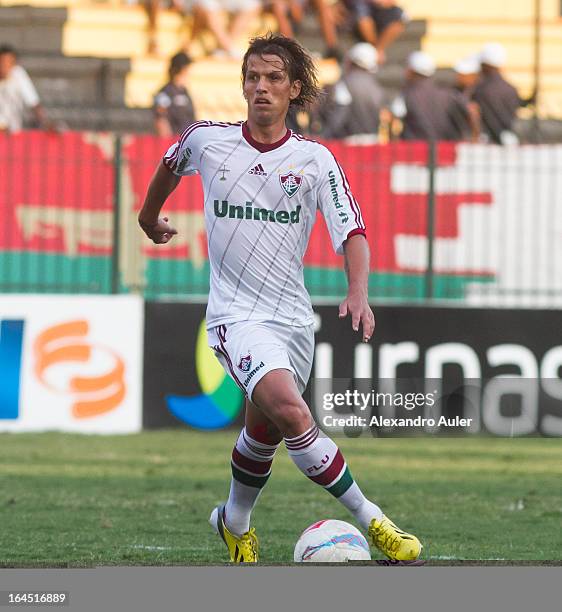 Diguinho of Fluminense drives the ball during the match between Fluminense and Duque de Caxias as part of Carioca Championship 2013 at Raulino de...