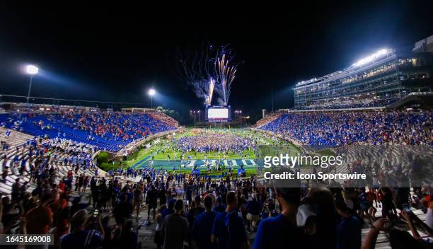 Duke Blue Devils fans rush the field after defeating the Clemson Tigers during a football game at Wallace Wade Stadium in Durham, North Carolina on...