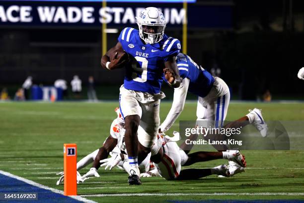 Jaquez Moore of the Duke Blue Devils runs for a touchdown against the Clemson Tigers during the second half of the game at Wallace Wade Stadium on...