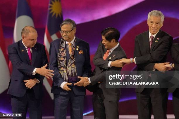 Cook Islands' Prime Minister Mark Brown, Bangladesh's President Mohammed Shahabuddin, Philippine's President Ferdinand Marcos and Singapore's Prime...