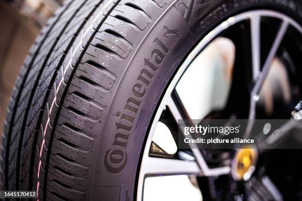 September 2023, Bavaria, Munich: Continental's lettering is seen on a tire made by tire manufacturer Continental AG during the press day of the IAA...