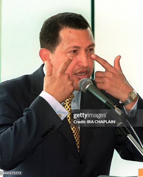 Venezuelan President Hugo Chavez, who is travelling with government officials and business executives, speaks to a group of prominent businessmen...