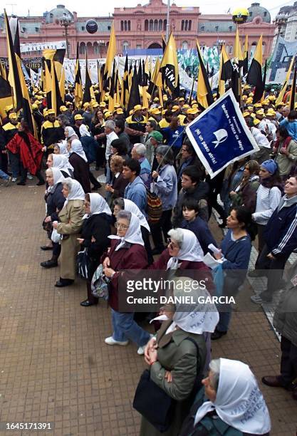 Mothers of the Plaza de Mayo gather, 31 May 2001, during their routine protest on Thursdays, in front of the President's house in Buenos Aires,...
