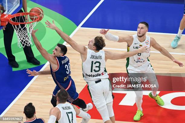 Serbia's Aleksa Avramovic goes for a layup during the FIBA Basketball World Cup quarter-final match between Lithuania and Serbia at Mall of Asia...