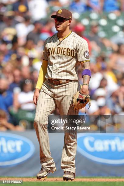 Manny Machado of the San Diego Padres anticipates a pitch during a game against the Milwaukee Brewers at American Family Field on August 27, 2023 in...