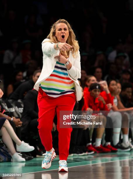 Head coach Becky Hammon of the Las Vegas Aces reacts during action against the New York Liberty at Barclays Center on August 28, 2023 in New York...
