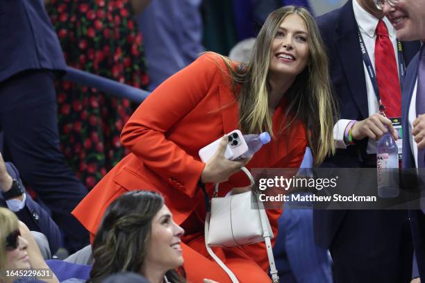 Russian former world No. 1 tennis player Maria Sharapova is seen during the Women's Singles First Round match between Coco Gauff of the United States...