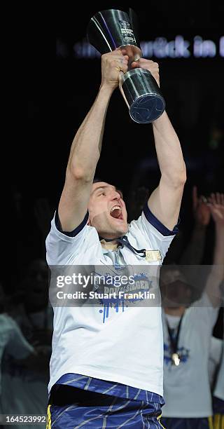 Sven Schultze, capatin of Berlin celebrates with the trophy after winning the Beko BBLTop Four final game between Ratiopharm Ulm and Alba Berlin at...