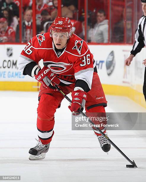 Jussi Jokinen of the Carolina Hurricanes skates with the puck during their NHL game against the Florida Panthers at PNC Arena on March 19, 2013 in...