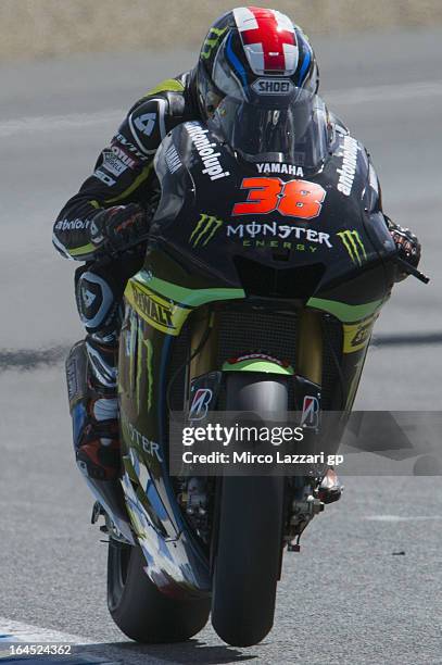 Bradley Smith of Great Britain and Monster Yamaha Tech 3 lifts the front wheel during the MotoGP Tests In Jerez - Day 3 at Circuito de Jerez on March...