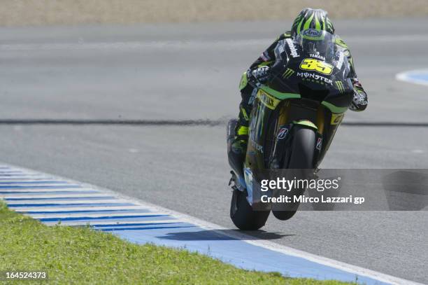 Cal Crutchlow of Great Britain and Monster Yamaha Tech 3 lifts the front wheel during the MotoGP Tests In Jerez - Day 3 at Circuito de Jerez on March...