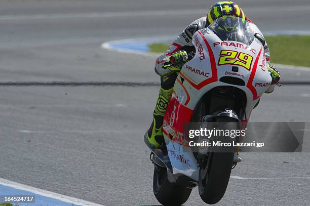 Andrea Iannone of Italy and Energy T.I. Pramac Racing Team lifts the front wheel during the MotoGP Tests In Jerez - Day 3 at Circuito de Jerez on...