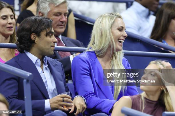 American former World Cup alpine ski racer Lindsey Vonn and boyfriend Diego Osorio are seen during the Women's Singles First Round match between Coco...