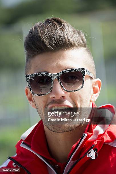 Andrea Iannone of Italy and Energy T.I. Pramac Racing Team speaks in paddock during the MotoGP Tests In Jerez - Day 3 at Circuito de Jerez on March...