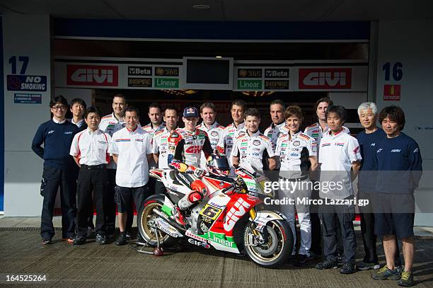The LCR Honda MotoGP Team pose for photographers during the MotoGP Tests In Jerez - Day 3 at Circuito de Jerez on March 24, 2013 in Jerez de la...