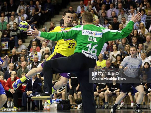 Ivan Nincevic of Berlin throws the ball during the HBL Champions League round of sixteen game between Fuechse Berlin and Atletico Madrid at Max...